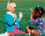 Preschool Girls Playing Patty Cake